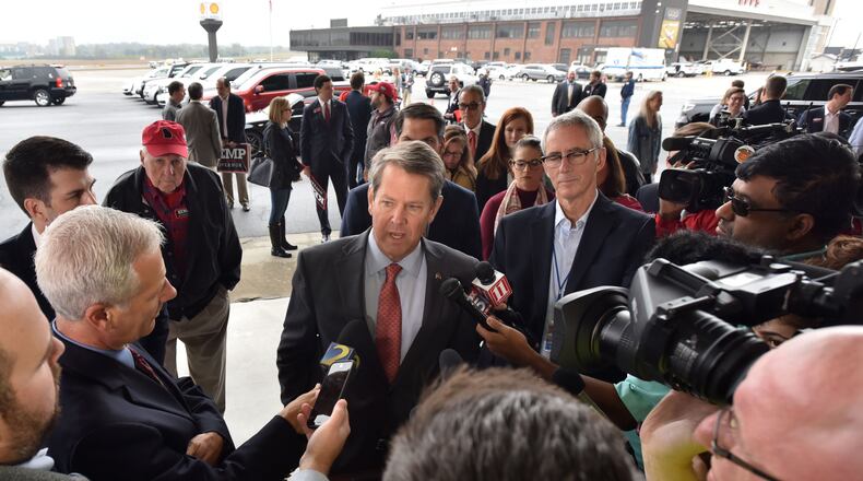 November 5, 2018 Atlanta - GOP gubernatorial candidate Brian Kemp speaks to members of the press ahead of his "Putting Georgians First" flyaround tour at Peachtree DeKalb Airport on Nov. 5, 2018. HYOSUB SHIN / HSHIN@AJC.COM