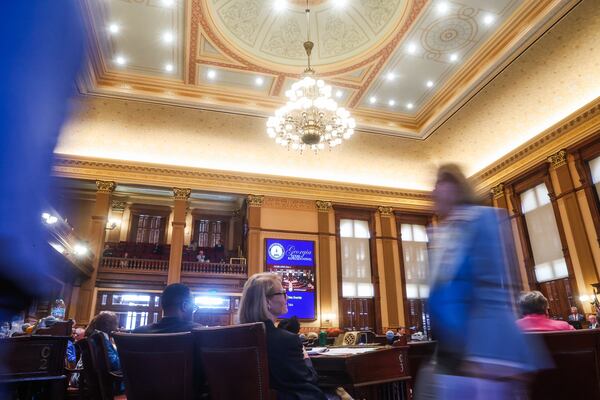 Representatives walk through the House floor as the state Legislature convenes for the fourth day of a special legislative session at the Capitol in Atlanta on Monday, June 22, 2026. (Abbey Cutrer/AJC)