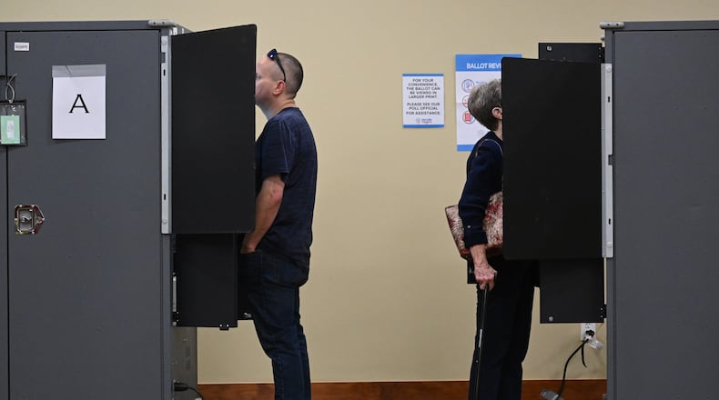 Cobb County residents vote at the polling station during the advance voting at North Cobb Senior Center, Tuesday, October 15, 2024, in Acworth. (Hyosub Shin / AJC)