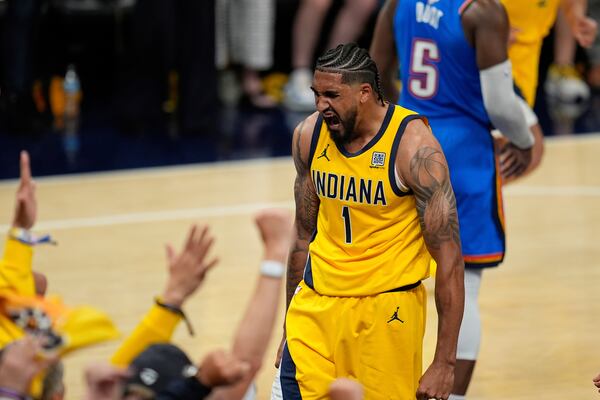 Indiana Pacers forward Obi Toppin (1) reacts to a basket against the Oklahoma City Thunder during the second half of Game 3 of the NBA Finals basketball series, Wednesday, June 11, 2025, in Indianapolis. (AP Photo/Abbie Parr)