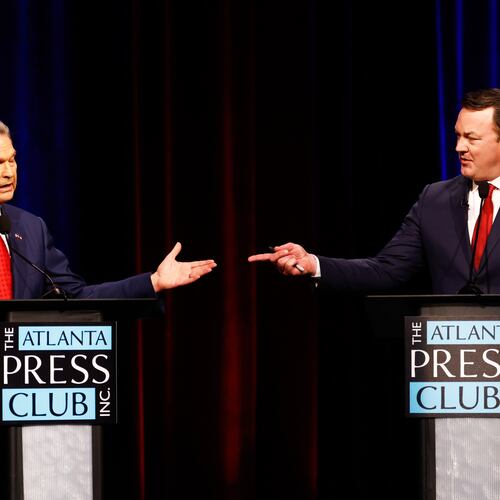 Republican candidates for governor, Rick Jackson, left, and Lt. Gov. Burt Jones interact at the Atlanta Press Club Loudermilk-Young Republican governor primary election debate at Georgia Public Broadcasting, Monday, April 27, 2026, in Atlanta. (Arvin Temkar/Atlanta Journal-Constitution via AP)