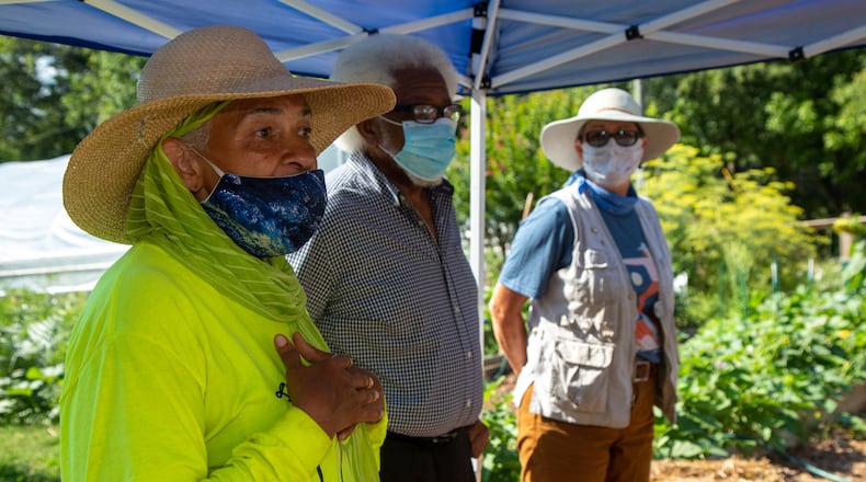 Garden teacher Terri Ali greets volunteers from the Food Well Alliance & other groups before they help in the Firdous Garden at the Mohammed Schools of Atlanta on Tuesday July 14th, 2020. PHIL SKINNER FOR THE ATLANTA JOURNAL-CONSTITUTION.