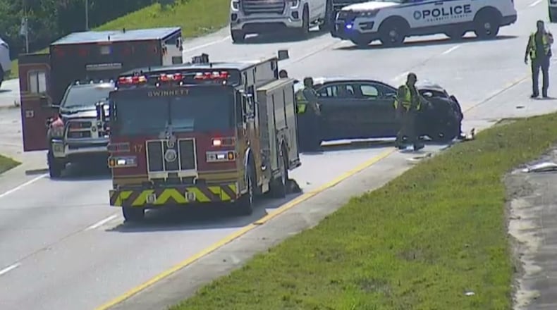 Emergency responders clean up a crash on Ga. 316 at Downing Creek Road in Dacula late Thursday afternoon.