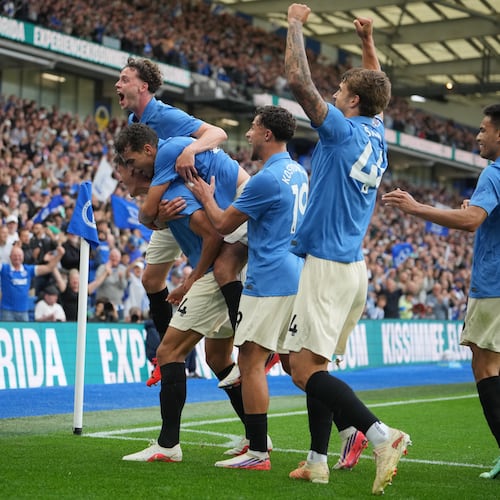 Brighton players celebrate after third goal during the English Premier League soccer match between Brighton & Hove Albion and Arsenal in Brighton, England, Saturday, Sept. 19, 2026. (AP Photo/Kin Cheung)