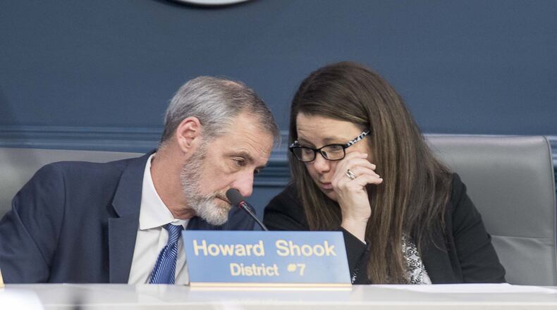 Atlanta Councilwoman Jennifer Ide (right), chair of the Finance/Executive committee, speaks with councilman Howard Shook (left), vice-chair of the committee, during a special called committee meeting to debate the creation of an Office of Inspector General. (ALYSSA POINTER/ALYSSA.POINTER@AJC.COM)
