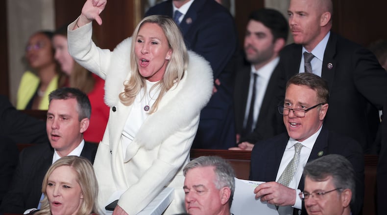 U.S. Rep. Marjorie Taylor Greene (R-Georgia) gives a thumbs down during President Joe Biden's State of the Union address during a joint meeting of Congress in the House Chamber of the U.S. Capitol on Feb. 7, 2023, in Washington, D.C. (Win McNamee/Getty Images/TNS)