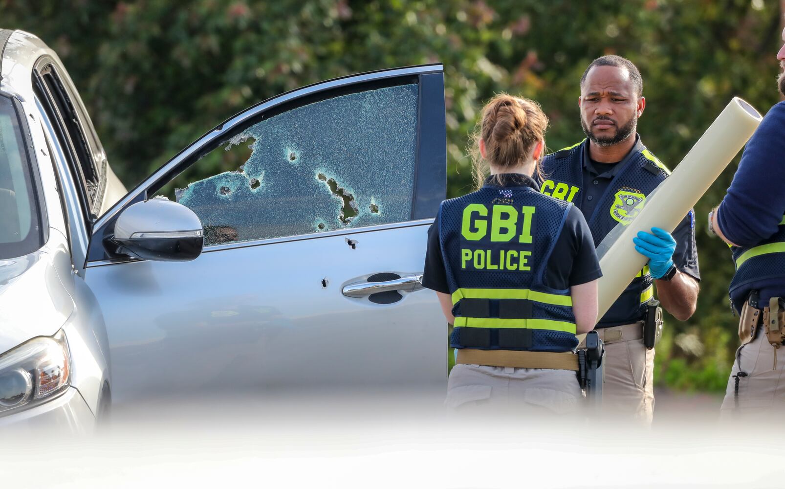 The GBI is investigating Wednesday, May 10, 2023, after Cobb County police shot a man and a woman after a pursuit that ended in Lithia Springs just before midnight Tuesday, according to officials. Police were called to a home on Drennon Drive near Austell Road at around 11:50 p.m. about an armed man, according to the GBI. Responding officers saw a suspected vehicle leaving the area. Immediately following the shooting, Thornton Road was shut down in that area for close to nine hours. (John Spink / John.Spink@ajc.com)

