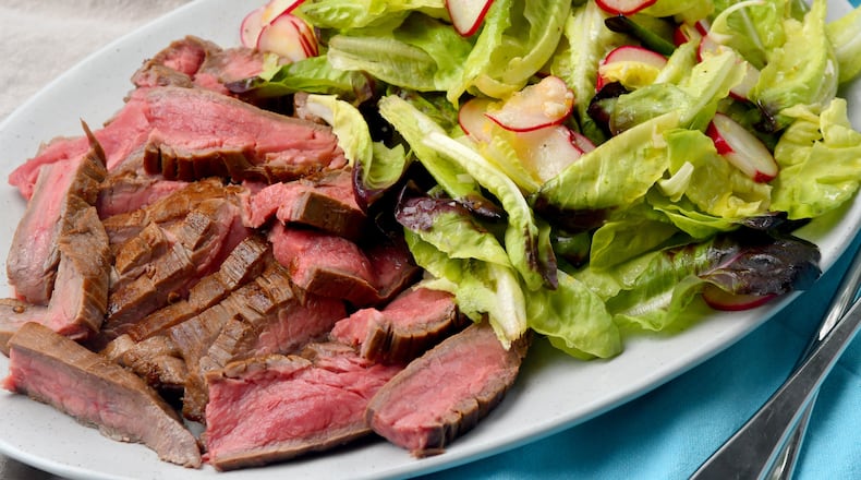 Broiled Flank Steak with Punchy Green Salad (Chris Hunt for The Atlanta Journal-Constitution)