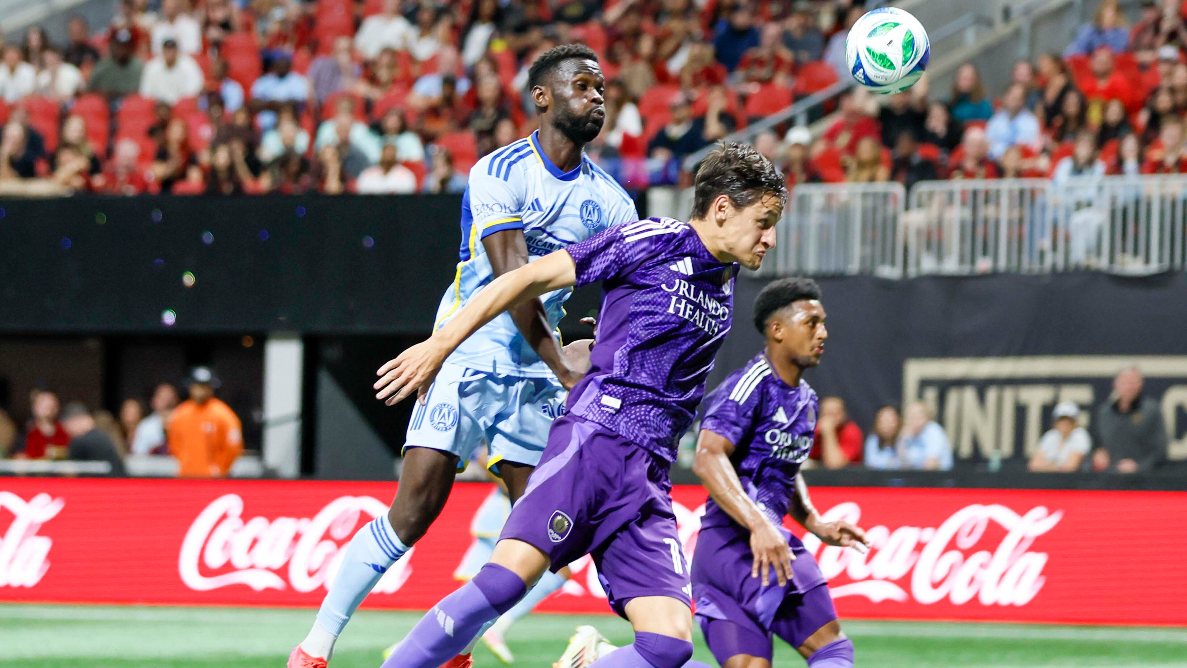 Atlanta United forward Emmanuel Latte Lath (19) goes up for a header under pressure from Orlando City defender Rodrigo Schlegel (15) during the first half against Orlando City at Mercedes-Benz Stadium on Wednesday, May 28, 2025, in Atlanta.
(Miguel Martinez/ AJC)
