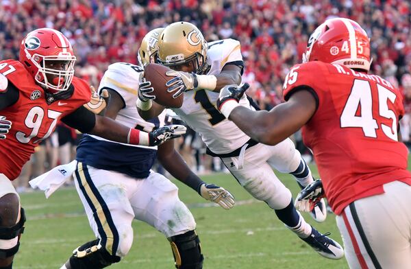 Georgia Tech running back Qua Searcy (1) dives into the endzone for the game winning touchdown at Sanford Stadium on Saturday, November 26, 2016. Georgia Tech won 28-27 over Georgia. HYOSUB SHIN / HSHIN@AJC.COM