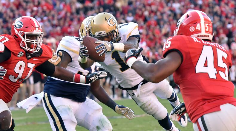 Georgia Tech running back Qua Searcy (1) dives into the endzone for the game winning touchdown at Sanford Stadium on Saturday, November 26, 2016. Georgia Tech won 28-27 over Georgia. HYOSUB SHIN / HSHIN@AJC.COM