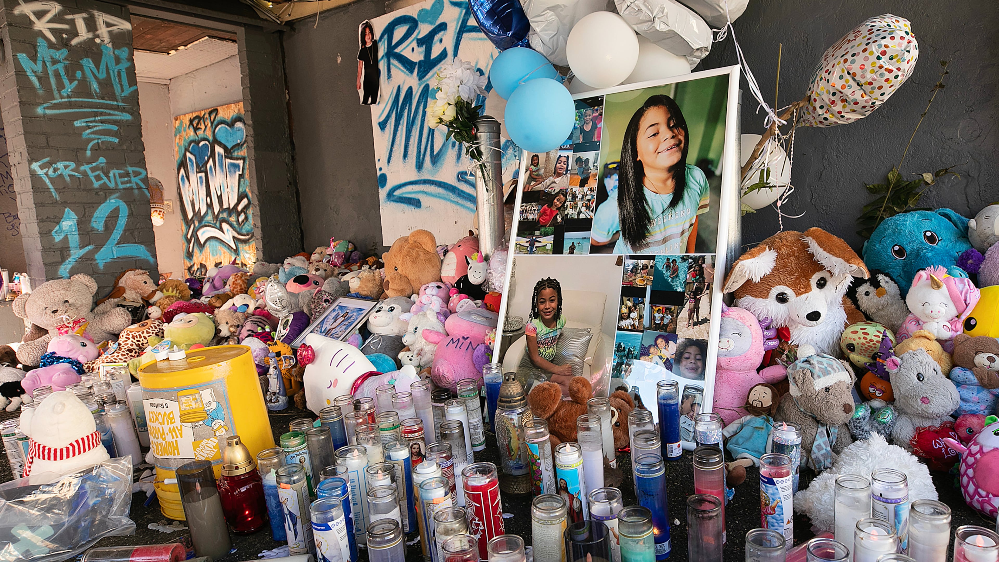 A memorial for Jacqueline "Mimi" Torres-Garcia, whose remains were found wrapped in plastic bags and bedding inside a plastic bin last month stands front of 80 Clark St., Thursday, Oct. 16, 2025, in New Britain, Conn. (Dave Zajac/Hearst Connecticut Media via AP)