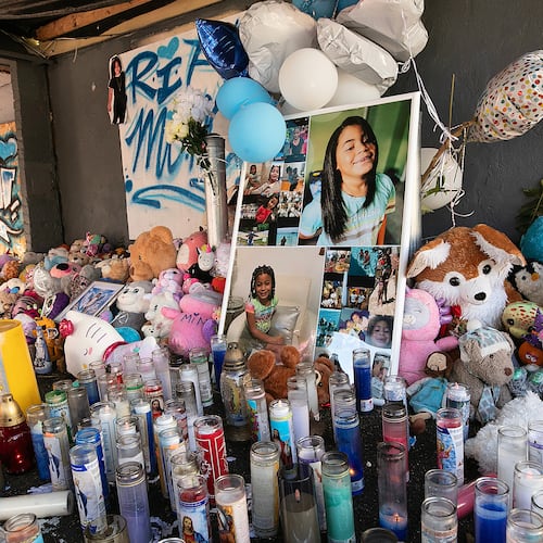 A memorial for Jacqueline "Mimi" Torres-Garcia, whose remains were found wrapped in plastic bags and bedding inside a plastic bin last month stands front of 80 Clark St., Thursday, Oct. 16, 2025, in New Britain, Conn. (Dave Zajac/Hearst Connecticut Media via AP)
