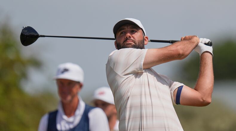 Scottie Scheffler of the United Statesplays off the 2nd tee during the final day of the British Open Golf championships at Royal Birkdale golf club, in Southport, England, Sunday, July 19, 2026. (AP Photo/David Goldman)