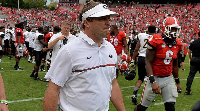 Kirby Smart walks off the field following Georgia's 17-16 loss to Vanderbilt Oct. 15.