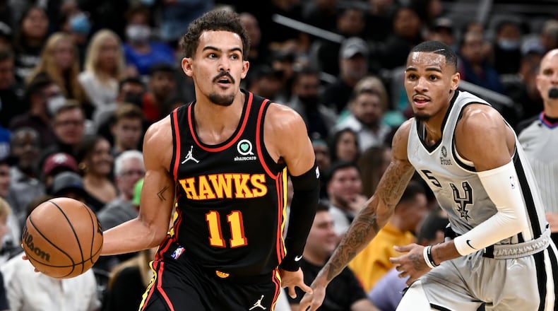The Hawks' Big Three of Dejounte Murray, Trae Young (11) and John Collins displayed their chemistry during The CrawsOver Pro-Am event in Seattle. (AP Photo/Darren Abate)