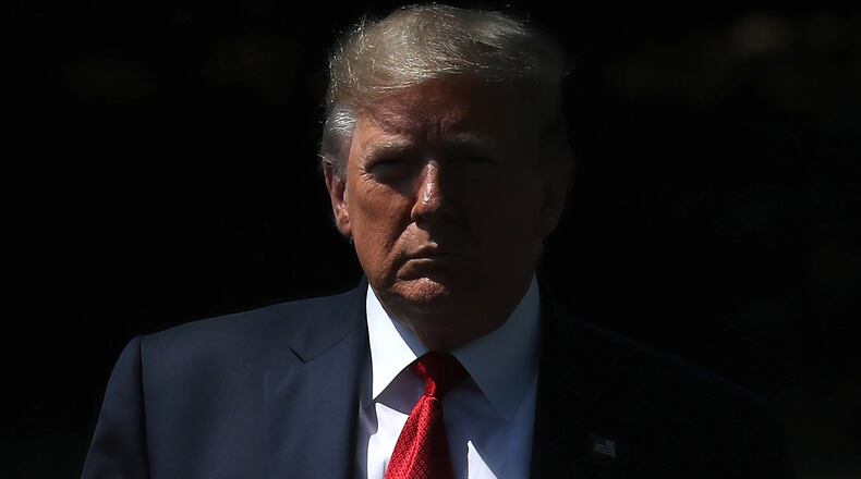 WASHINGTON, DC - AUGUST 21: U.S. President Donald Trump walks up to speak to the media before departing from the White House on August 21, 2019 in Washington, DC. President Trump spoke on several topics including the U.S. economy and why he canceled his trip to Denmark. (Photo by Mark Wilson/Getty Images)