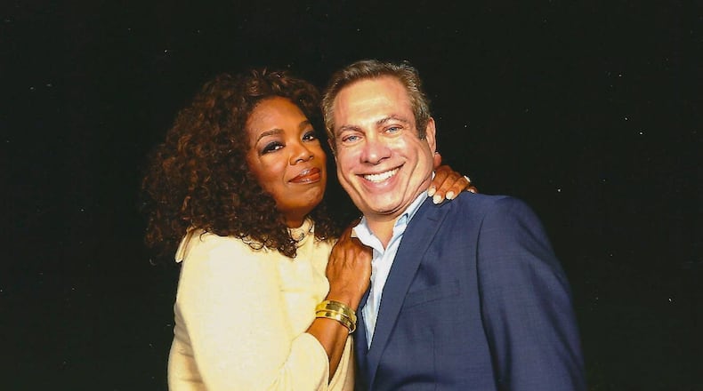 Author David Kessler shares a moment with Oprah Winfrey. CONTRIBUTED
