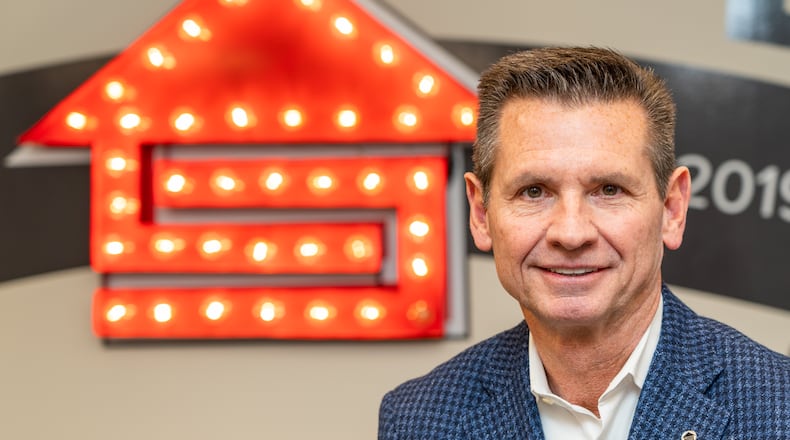 Portrait of CEO Pat Flood in the Supreme Lending Southeast region training room in Alpharetta. For the AJC Top Workplace midsize story. PHIL SKINNER FOR THE ATLANTA JOURNAL-CONSTITUTION.