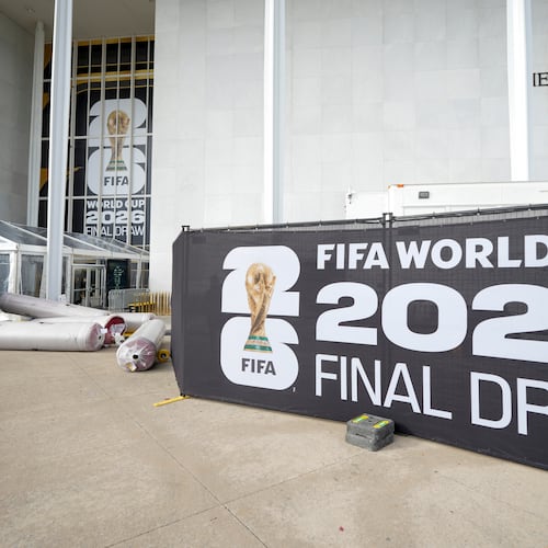 The red carpet is delivered prior to the final draw for the 2026 soccer World Cup at the Kennedy Center in Washington, Thursday, Dec. 4, 2025. (AP Photo/Chris Carlson)