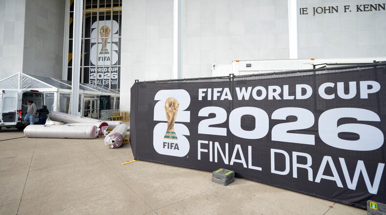 The red carpet is delivered prior to the final draw for the 2026 soccer World Cup at the Kennedy Center in Washington, Thursday, Dec. 4, 2025. (AP Photo/Chris Carlson)
