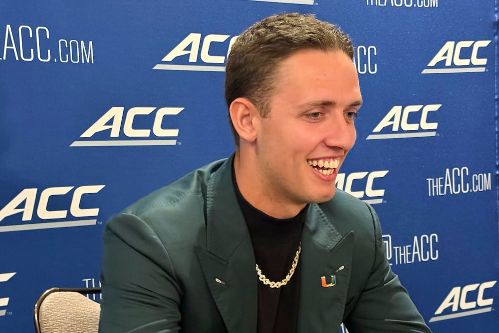 Judging by the chain, former Georgia quarterback Carson Beck has embraced life in Miami. 