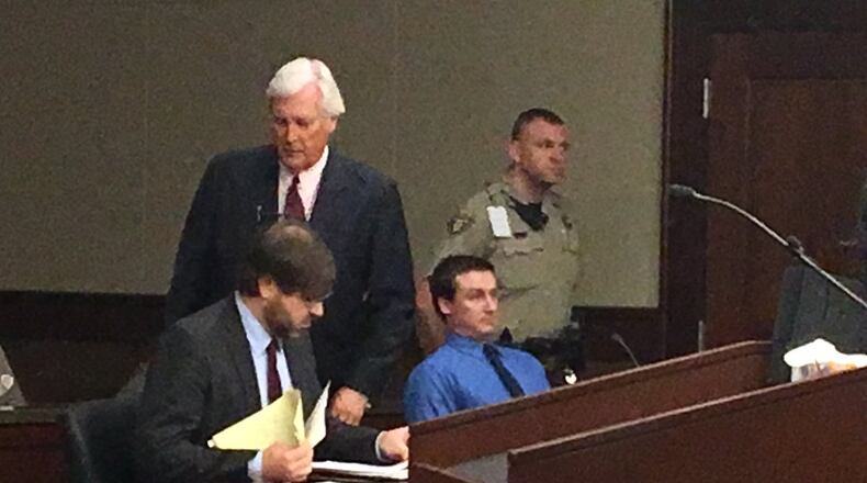 James Bradshaw Clement (blue shirt) will remain in the Cobb County jail without bond.