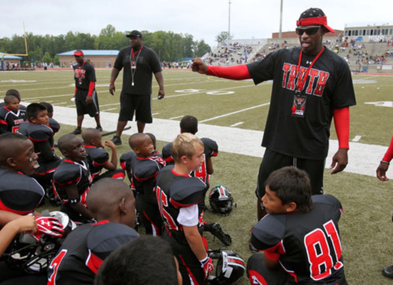 Heading for hall of fame, Deion coaches youth