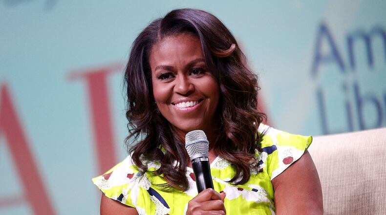 Former first lady Michelle Obama discusses her forthcoming memoir titled, "Becoming", during the 2018 American Library Association Annual Conference. Obama announced a 10-city tour in support of her book. (Photo by Jonathan Bachman/Getty Images)