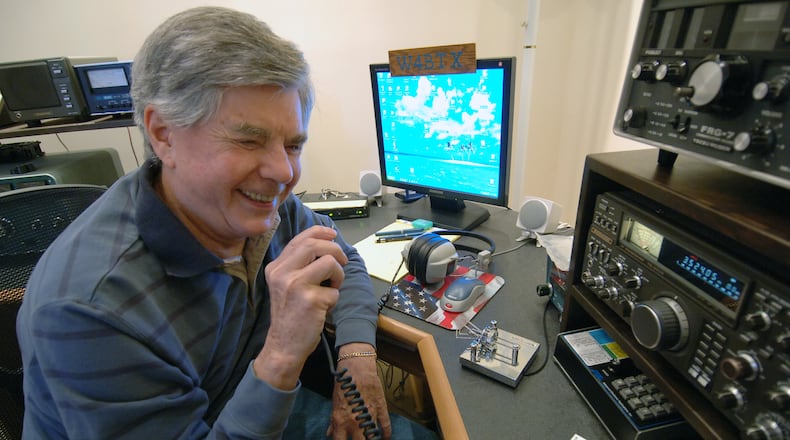 John Beckman, the meteorologist known as “Johnny the Weatherman," passed away on Sunday at age 90. Beckman was a fixture on Atlanta TV from 1962 until his retirement in 1995, working first for WSB-TV, then WXIA-TV. (AJC FILES)