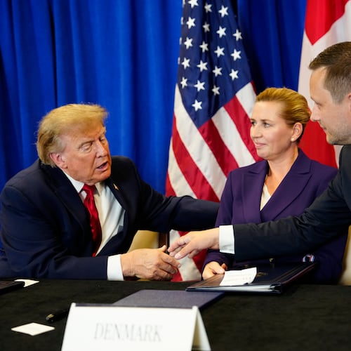 Denmark's Prime Minister Mette Frederiksen, center, Greenland's Prime Minister Jens-Frederik Nielsen, right, and US President Donald Trump at the signing ceremony of a security deal between the U.S., Denmark and Greenland at United Nations headquarters, Tuesday, Sept. 22, 2026. (Mads Claus Rasmussen/Ritzau Scanpix via AP)