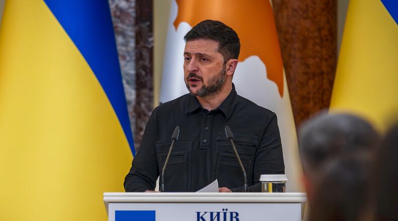 Ukrainian President Volodymyr Zelenskyy attends a joint news conference with Cyprus' President Nikos Christodoulides in Kyiv, Ukraine, Thursday, Dec. 4, 2025. (AP Photo/Dan Bashakov)
