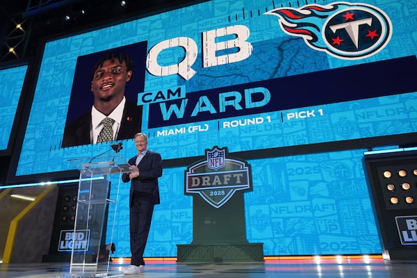 NFL Commissioner Roger Goodell announces Miami quarterback Cam Ward after being chosen by the Tennessee Titans with the first overall pick during the first round of the NFL football draft, Thursday, April 24, 2025, in Green Bay, Wis. (AP Photo/Jeff Roberson)