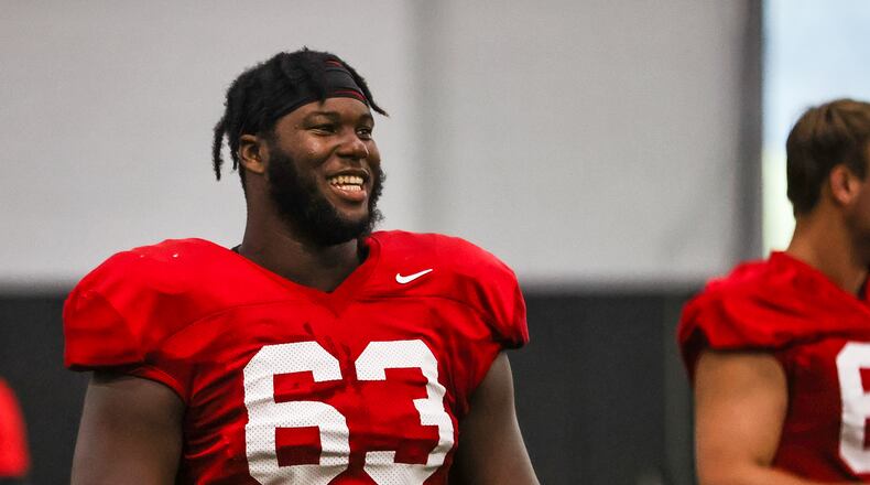 Georgia offensive lineman Sedrick Van Pran (63) smiles during the Bulldogs’ practice session Thursday, Aug. 19, 2021, in Athens. (Photo by Mackenzie Miles/UGA Athletics)