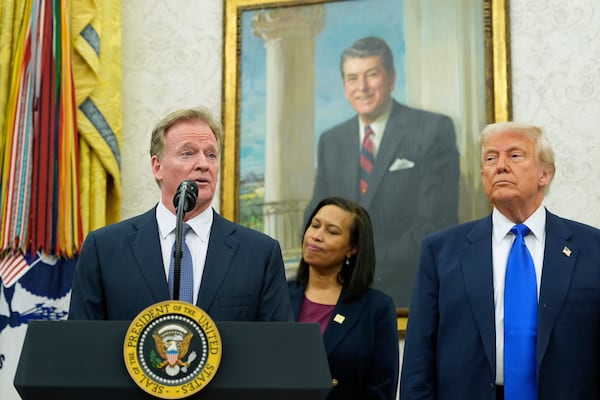 NFL Commissioner Roger Goodell, from left, speaks as District of Columbia Mayor Muriel Bowser and President Donald Trump listen during an event to announce that the 2027 NFL Draft will be held on the National Mall, in the Oval Office of the White House, Monday, May 5, 2025, in Washington. (AP Photo/Alex Brandon)