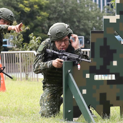 Soldiers conduct shooting training during the annual Han Kuang military exercises in Taipei, Taiwan, Wednesday, Aug. 5, 2026. (AP Photo/Chiang Ying-ying)