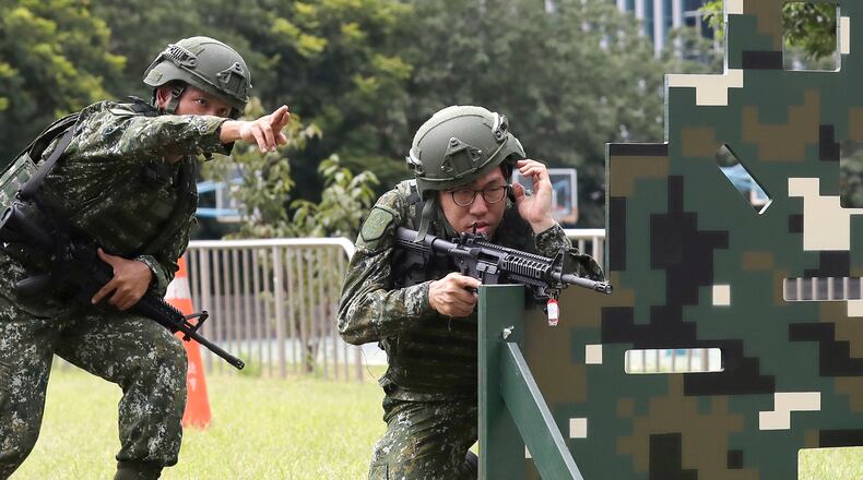 Soldiers conduct shooting training during the annual Han Kuang military exercises in Taipei, Taiwan, Wednesday, Aug. 5, 2026. (AP Photo/Chiang Ying-ying)