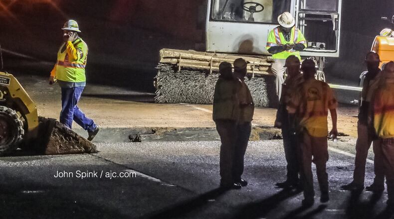 All lanes of of I-285 West at Old National Highway have reopened after crews worked through the night to repair a sinkhole.