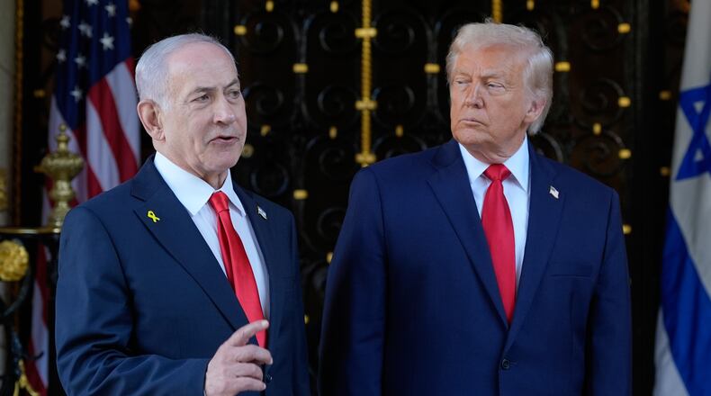 FILE - President Donald Trump listens as Israel's Prime Minister Benjamin Netanyahu speaks at President Donald Trump's Mar-a-Lago club, Dec. 29, 2025, in Palm Beach, Fla. (AP Photo/Alex Brandon, File)