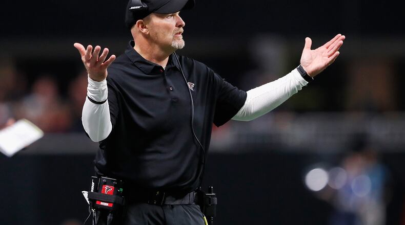 Falcons head coach Dan Quinn of the Atlanta Falcons reacts during the second half against the Packers at Mercedes-Benz Stadium on September 17 in Atlanta.