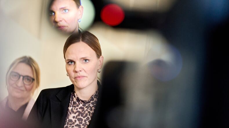 Caroline Stage, Danish Minister for Digitalization and representatives from the agreement parties attends a press conference about a new political agreement for better protection of children and young people online, in Copenhagen, Friday, Nov. 7, 2025. (Thomas Traasdahl/Ritzau Scanpix via AP)