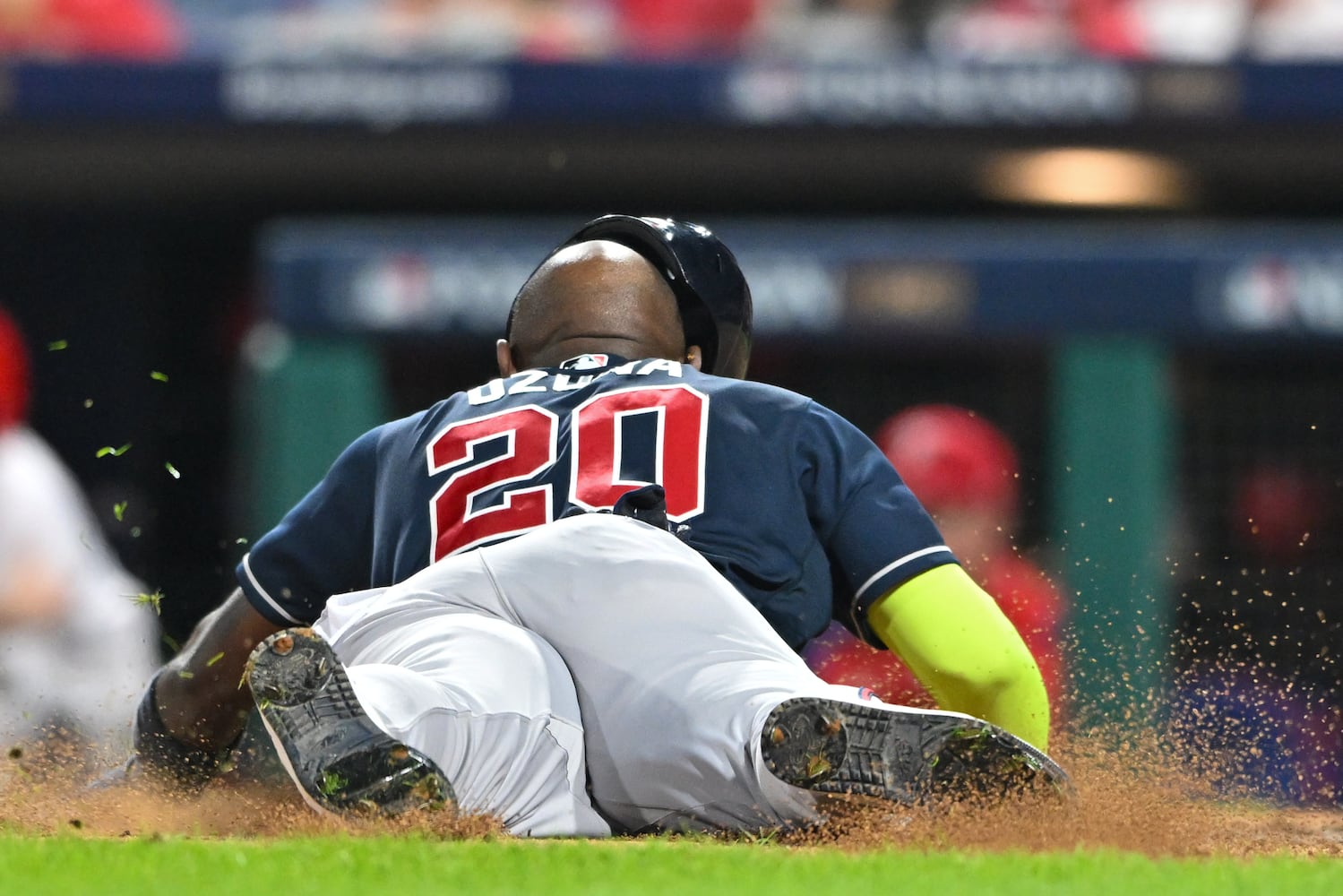 Atlanta Braves’ Marcell Ozuna (20) scores against the Philadelphia Phillies during the sixth inning of NLDS Game 3 in Philadelphia on Wednesday, Oct. 11, 2023.   (Hyosub Shin / Hyosub.Shin@ajc.com)