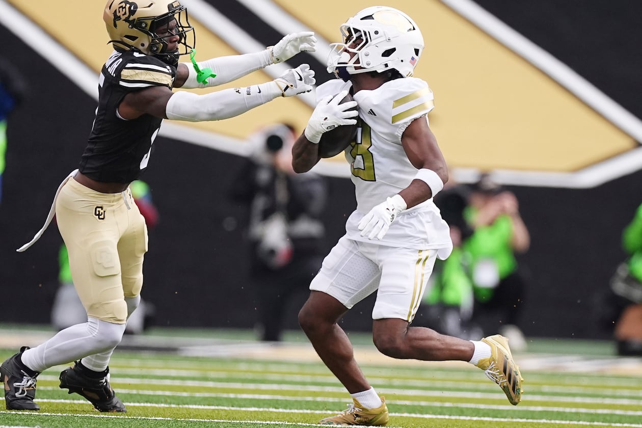 Colorado cornerback RJ Johnson, left, reaches out to stop Georgia Tech wide receiver Malik Rutherford in an NCAA college football game Friday, Aug. 29, 2025, in Boulder, Colo. (David Zalubowski/AP)