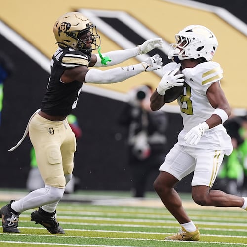 Colorado cornerback RJ Johnson, left, reaches out to stop Georgia Tech wide receiver Malik Rutherford in an NCAA college football game Friday, Aug. 29, 2025, in Boulder, Colo. (David Zalubowski/AP)
