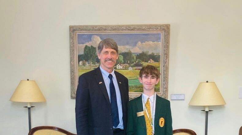 Legislative page Dean Roy is pictured with Vermont Lieutenant Governor John Rodgers on Friday, February 14, 2025, in Montpelier, Vermont. (Chessie Roy via AP)