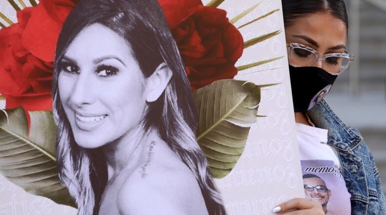 Sabrina Cartier attends a rally to call for justice in the death of her cousin Monique Munoz in Los Angeles on March 19, 2021. Munoz, 32, was killed in a car accident on Feb. 17.