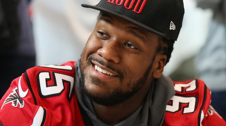 February 1, 2017, Houston: Falcons 12-year defensive player Jonathan Babineaux styles a “Brotherhood†hat, the team motto, during Super Bowl media availability on Wednesday, Feb. 1, 2017, at the Memorial City Mall ice arena in Houston. Curtis Compton/ccompton@ajc.com