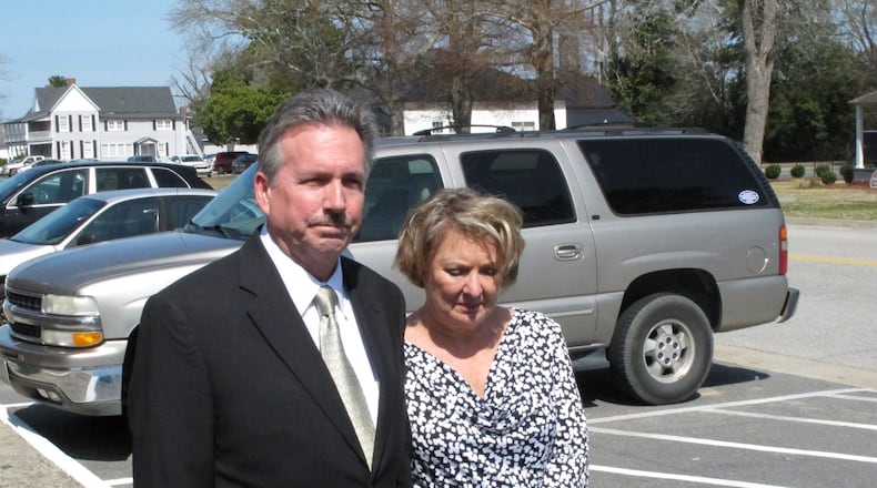 Richard and Elizabeth Jones, whose daughter was killed by a train on a Georgia movie set, speak with reporters outside the Wayne County Courthouse, Monday, March 9, 2015, in Jesup, Ga., after the film’s director and executive producer pleaded guilty to charges of involuntary manslaughter and criminal trespassing. Director Randall Miller and executive producer Jay Sedrish had just begun filming “Midnight Rider,” a movie about singer Gregg Allman, when a train plowed into their crew Feb. 20, 2014, killing camera assistant Sarah Jones and injuring six others. (AP Photo/Russ Bynum)