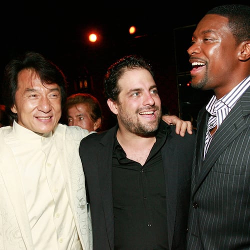 FILE - Jackie Chan, from left, Brett Ratner and Chris Tucker appear at the "Rush Hour 3" premiere after party in Los Angeles on July 30, 2007. (AP Photo/Matt Sayles, File)