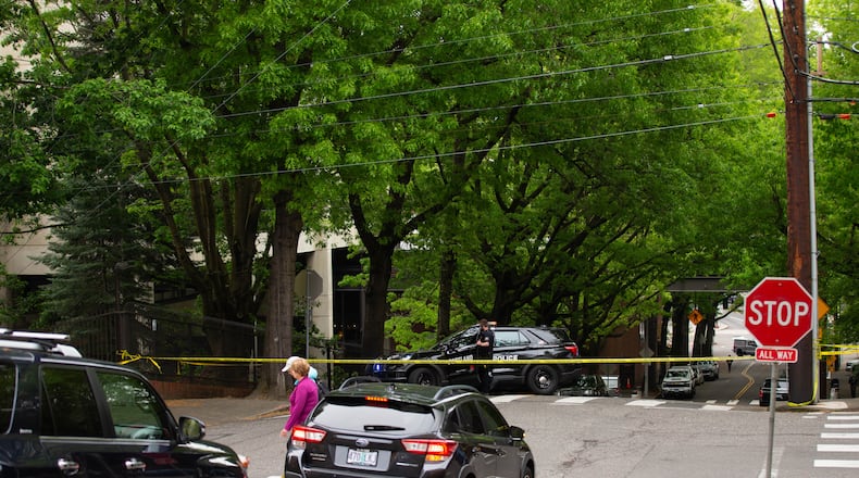 Police shut down the block surrounding the Multnomah Athletic Club in Northwest Portland, Ore., on Saturday, May 2, 2026. (Allison Barr/The Oregonian via AP)